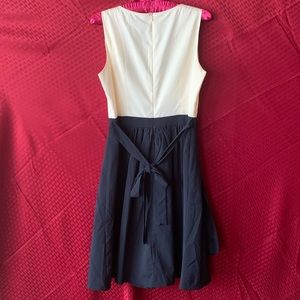 Beige/navy blue woman’s dress
